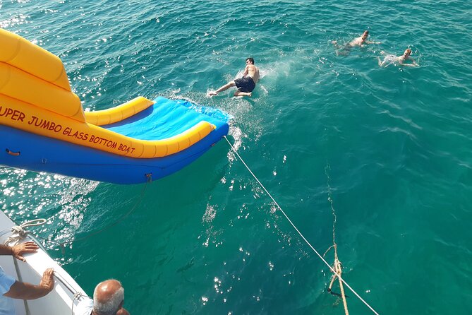 2.5 hour Glass Bottom Boat Trip, Snorkeling, Sliding and Fun - The swimming stop is where the trip comes alive