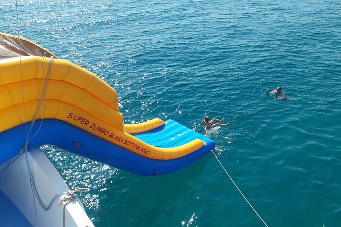 2.5 hour Glass Bottom Boat Trip, Snorkeling, Sliding and Fun - Food, drinks, and comfort onboard