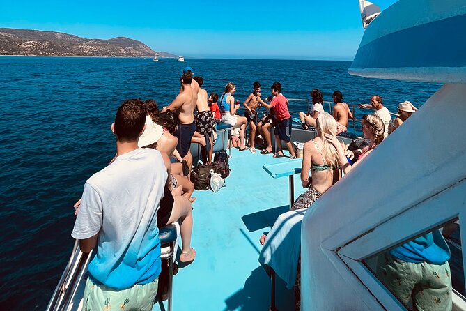 Blue Lagoon cruise: giant slide, music & Paphos hotel transfers - Music, drinks, and the onboard mood