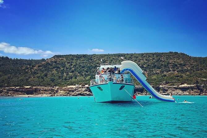 Blue Lagoon trip with slide & music departing from Latchi harbour - Manolis Bay and the story behind the cave