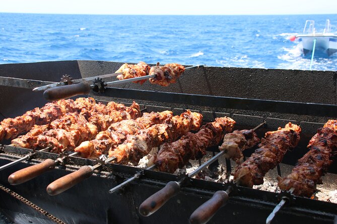Half-Day Odyssey Guided Boat Safari with Lunch in Cyprus - Cape Pyla brings red cliffs and sea caves