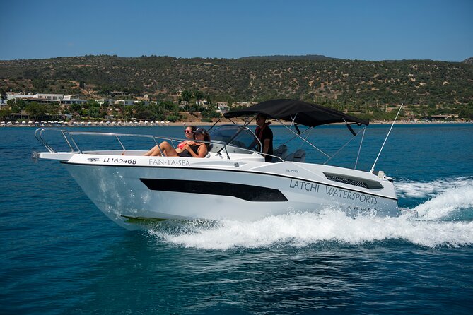 Karnic SL702 boat with driver, WC,Cabin, BT music and shower - Taking the wheel from Latchi Harbour