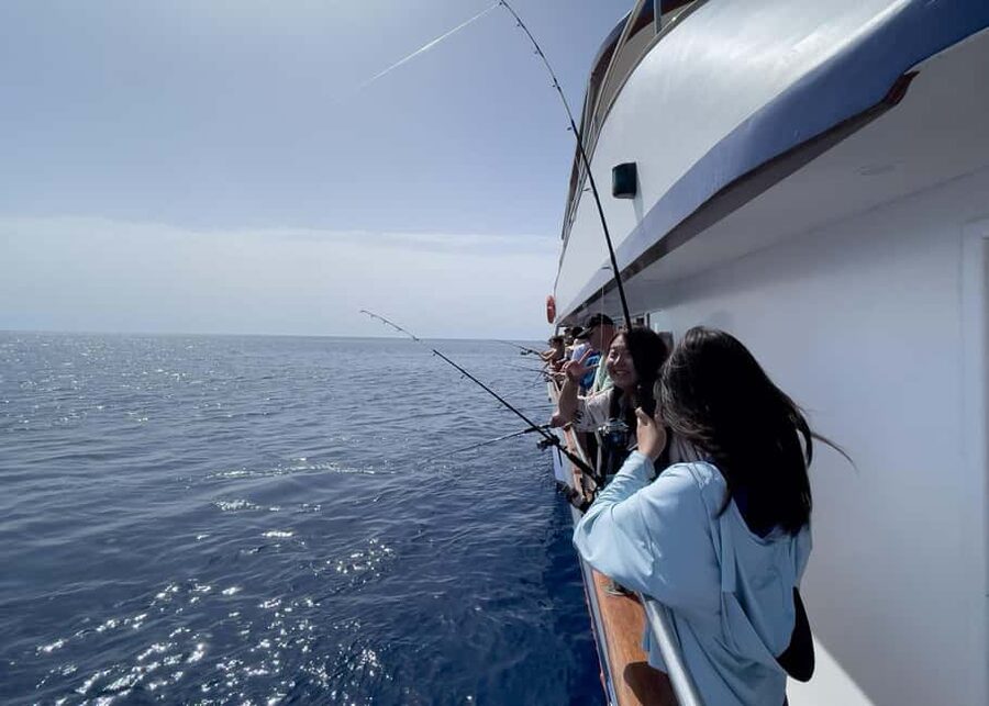 Larnaca: Glass-Bottom Boat Cruise with Fishing and BBQ Lunch - Planes close overhead along Larnaca’s west coast