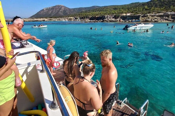 Nafsika II Half Day Cruise Swimming to blue lagoon water slide - Manolis Bay, Blaji Bay, and the sea caves
