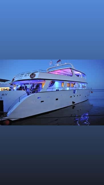 Protaras: 80s and 90s Sunset Cruise with Cypriot Dinner & DJ - Turtle Bay and the Blue Lagoon swim